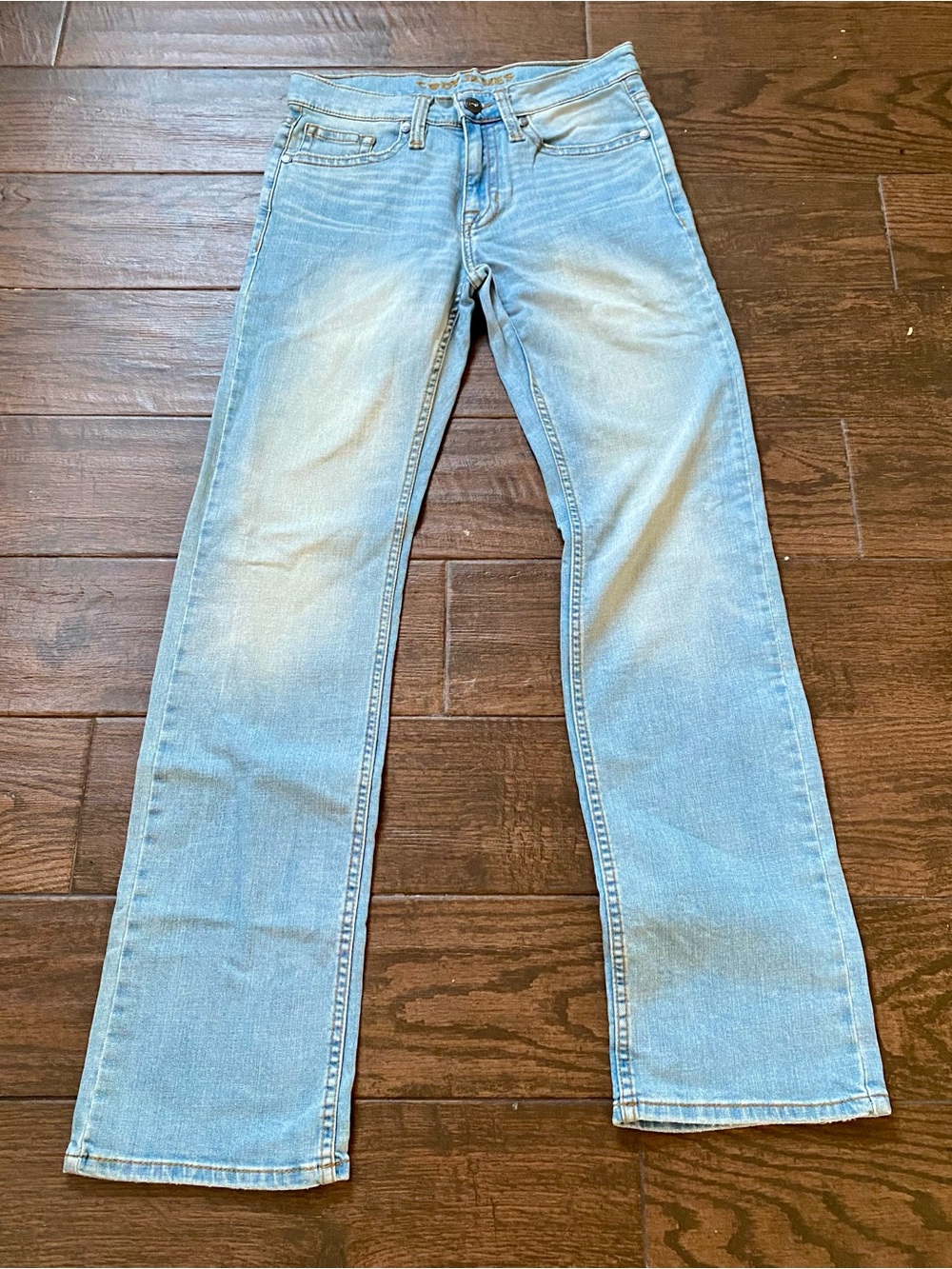 Cody James brand jeans feature a light wash denim